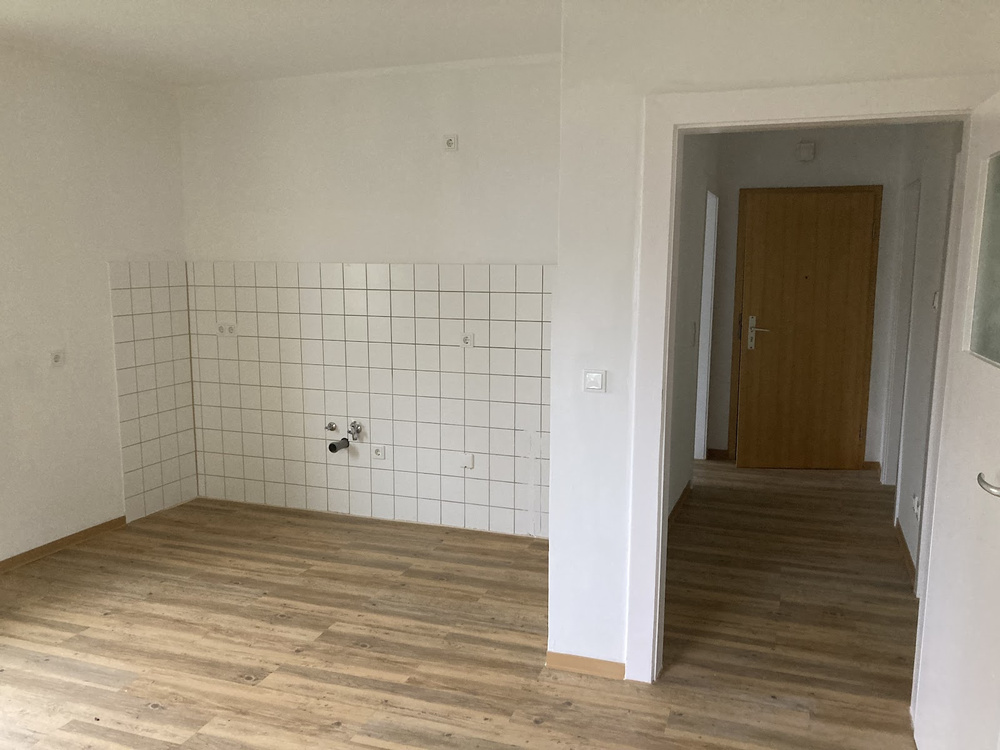 Wohnzimmer mit Küche