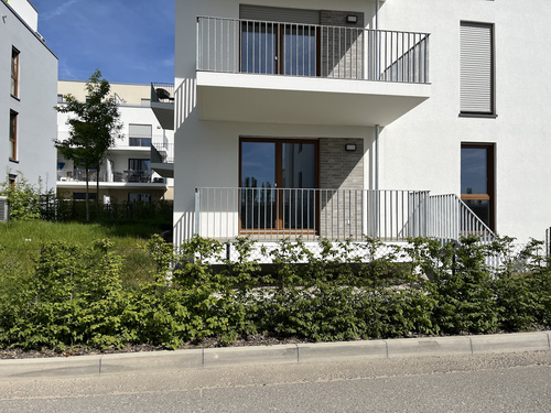 Helle EG-Neubauwohnung mit eigenem Gartenanteil